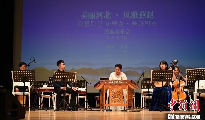 圖為音樂會現(xiàn)場?！∈谞栔袊幕行墓﹫D