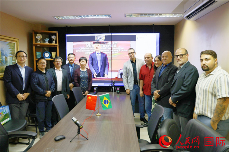 參與備忘錄簽署儀式的嘉賓合影。人民網記者 陳海琪攝
